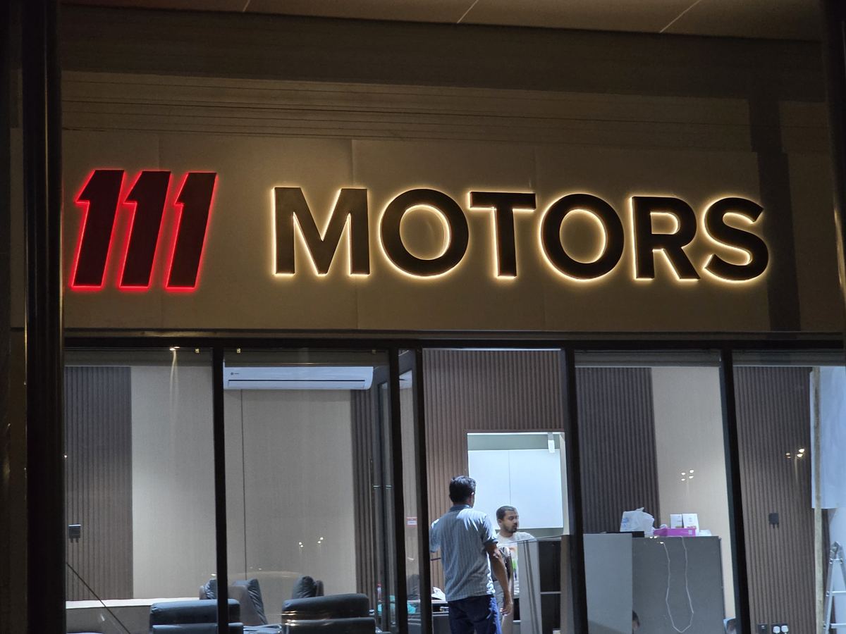 111 Motors backlit signage